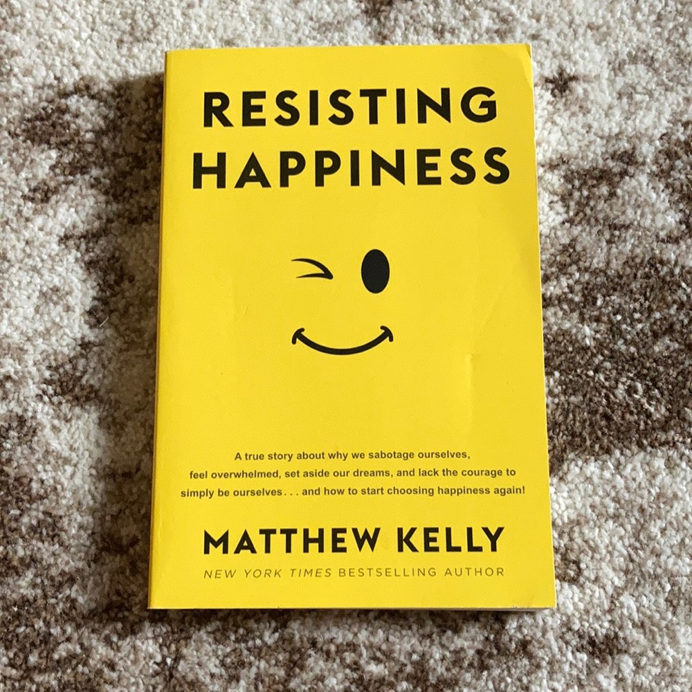 Book resisting happiness
